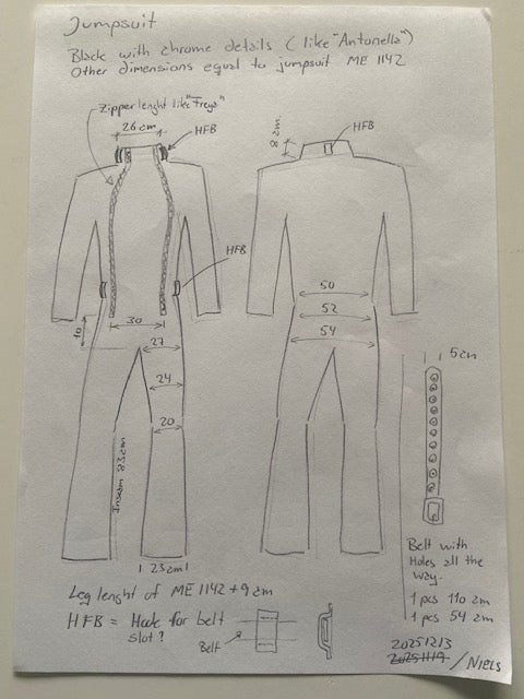 Technical drawing of a garment layout on a piece of paper.