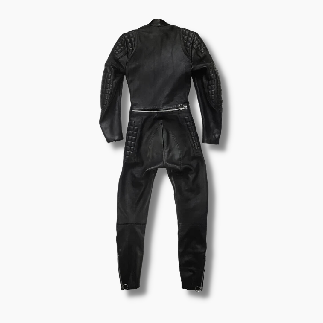 Racing experience with our real leather padded jumpsuit, designed for bikers seeking extra protection. Featuring YKK zipper closure and soft polyester lining for comfort. Professionally handmade with premium stitching and double-stitched joints for durability. Shop now for the ultimate motorcycle suit!